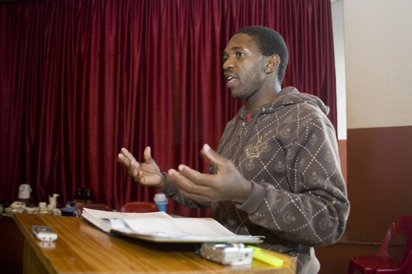 Alfred Magagula clarifies a point during a workshop with community police in Ngwenya