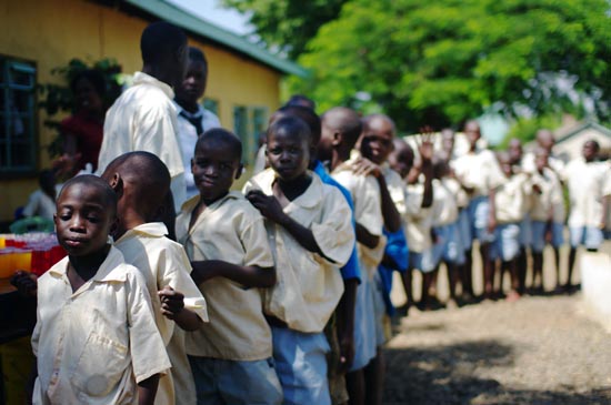 Children at the Kisumu Children's Remand Home wait for Lunch
