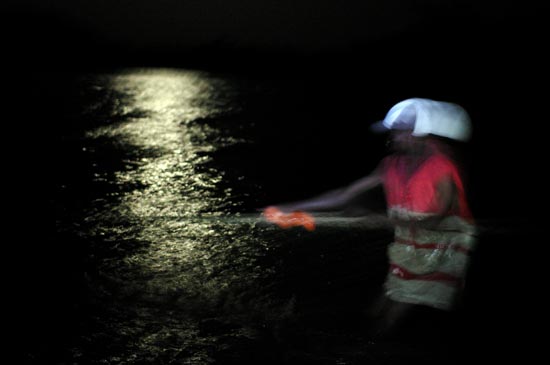 Fisherman on Lake Victoria in the middle of the night