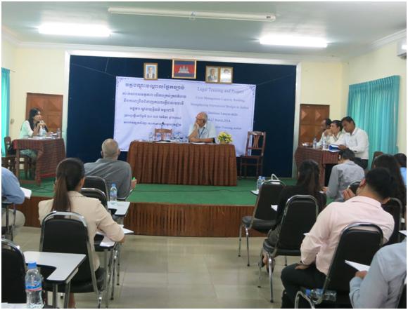 Mock Trial with Song Chorvoin as the victim (left), Keith Raynor as the judge (middle), and the defense team composed of IBJ lawyers and lawyer assistants (right)