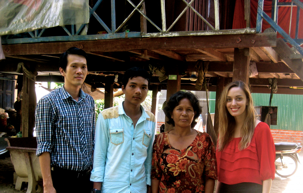 (Sothea (lawyer), Sopheak, Sopheak’s mother, Me (legal intern); Taken at their home.)