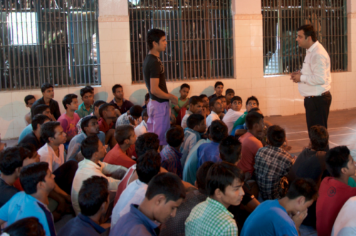 Ajay Verma, IBJ Legal Fellow, speaking with an inmate